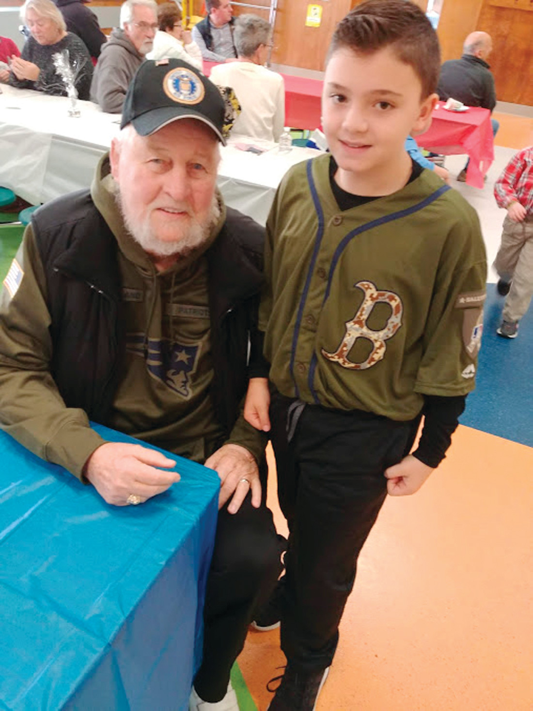 PROUD GRANDSON: Ethan Davis was proud to be present at the mornings events with his grandfather, veteran Martin Normann, who served in the Air Force for four years.